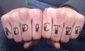 addicted-knuckle-tattoo